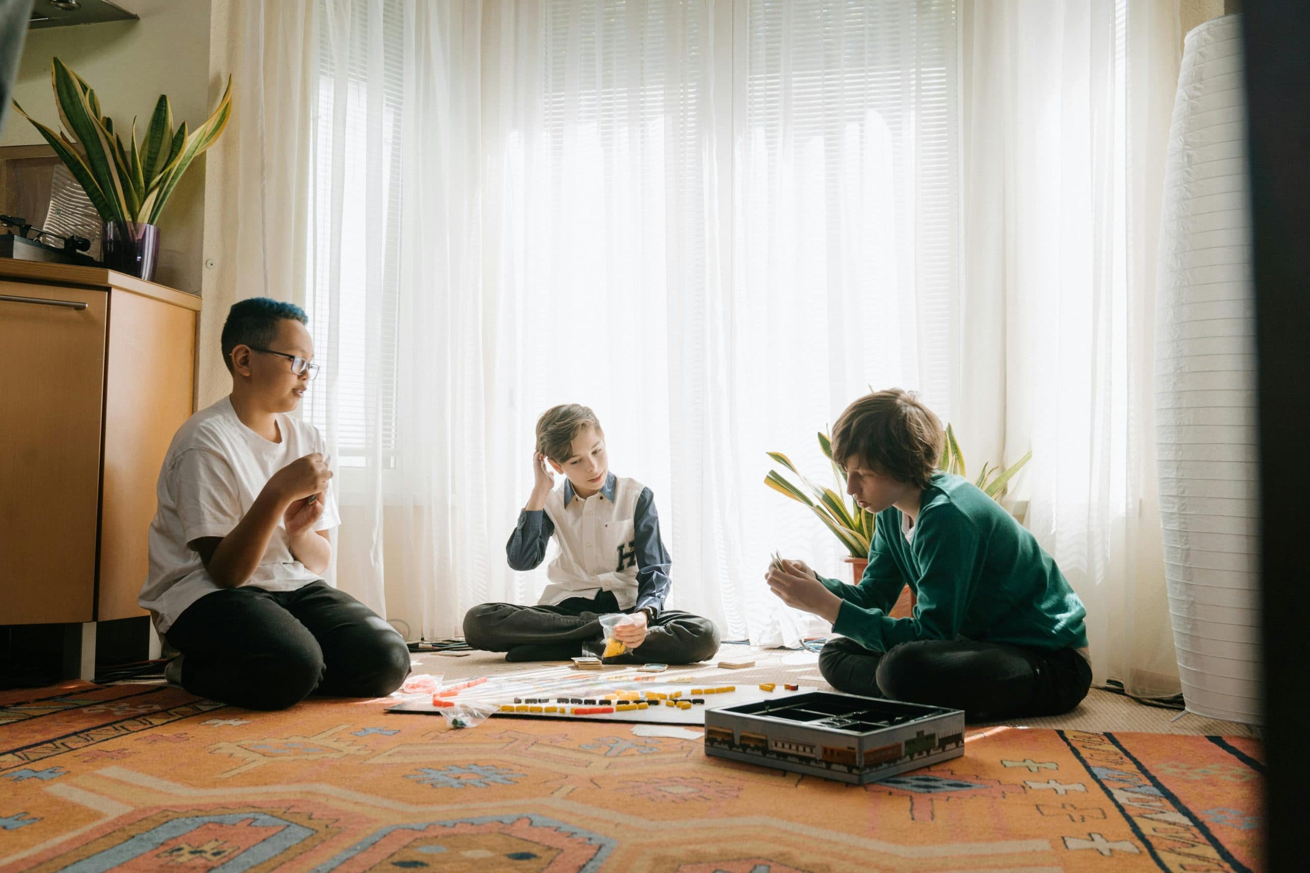 Kids playing board games together